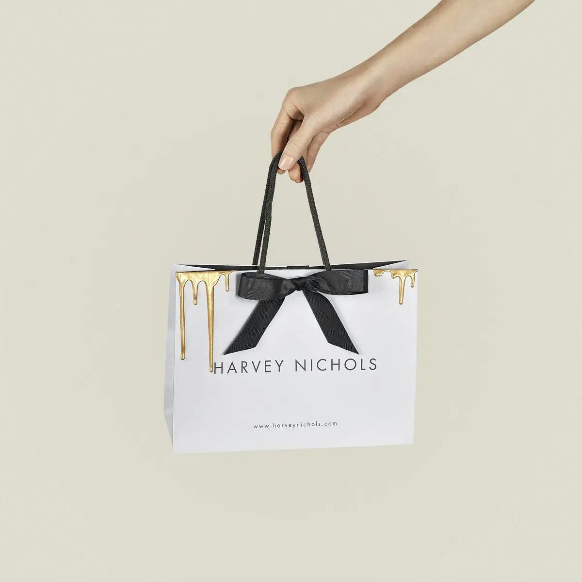 Harvey Nichols bag filled with gold